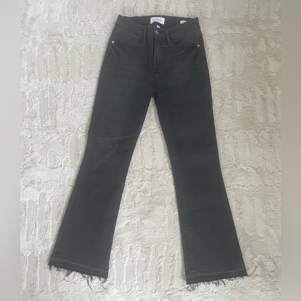 Frame cropped kick flare faded black jeans